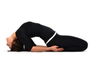 person is performing Matsyasana yoga asan to recover from thyroid